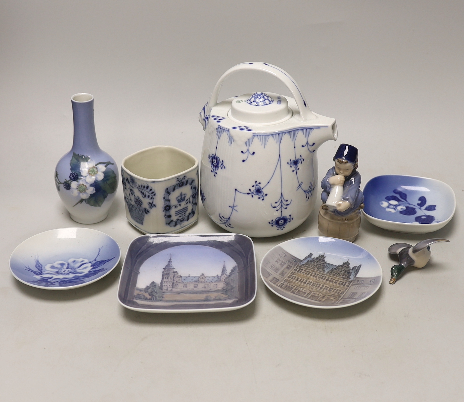A group of Royal Copenhagen porcelain including an onion pattern teapot